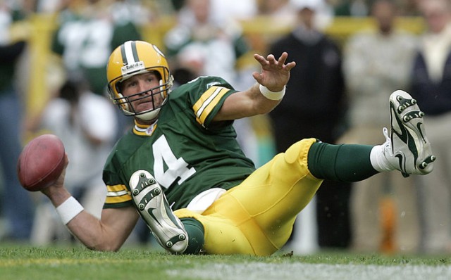 ** FILE ** Green Bay Packers quarterback Brett Favre looks to pass the ball after falling down during the second quarter of their NFL football game in Green Bay, Wis., in this Sept. 10, 2006 file photo. Brett Favre has decided to retire from the NFL after 17 seasons. FOX Sports first reported Tuesday March 4, 2008 that the Green Bay Packers quarterback informed the team in the last few days. (AP Photo/ Morry Gash, file)